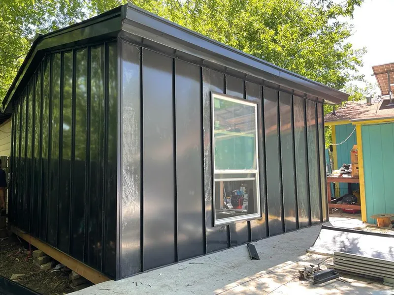 Black standing seam metal wall panels for Roof Inspection in Anderson